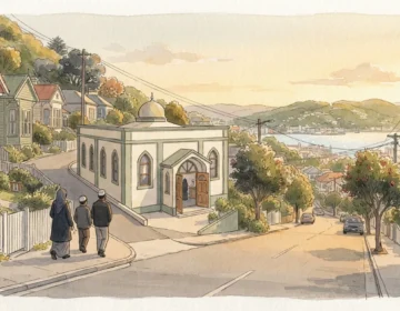 Illustration of a small Islamic centre on a hilly Wellington street at golden hour